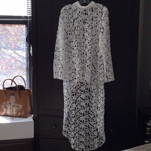 Asymmetrical white top.